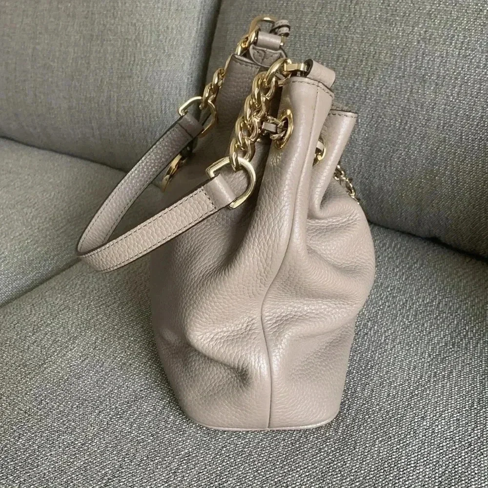 Michael Kors crossbody chain drawstring  bucket bag neutral putty color